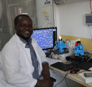 Joram at IHI using the OpenFlexure Microscope to image blood smears.