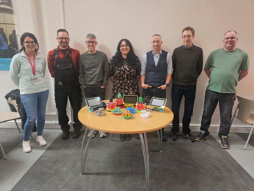 Image of the Live Cell Imaging (LCI) team with a selection of LCI-OpenFlexure Microscopes