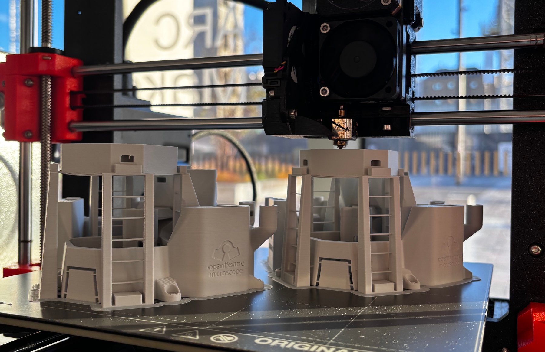 Image of a 3d printer printing the openflexure microscope